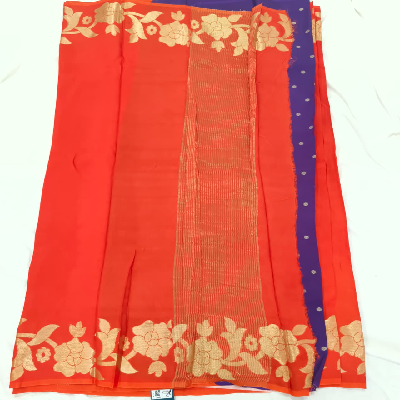Orange Fancy Crepe Saree with Purple Contrast blouse